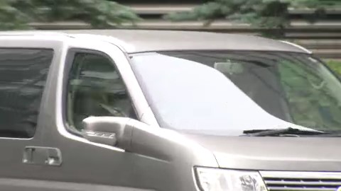 小西優花被告を乗せた車