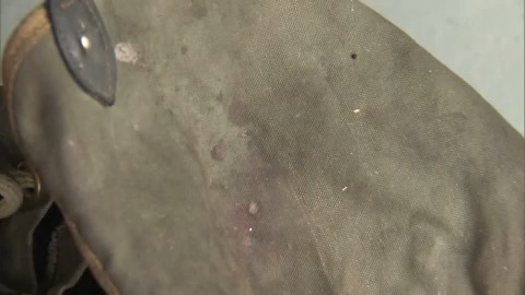 広範囲に血痕がついたリュック