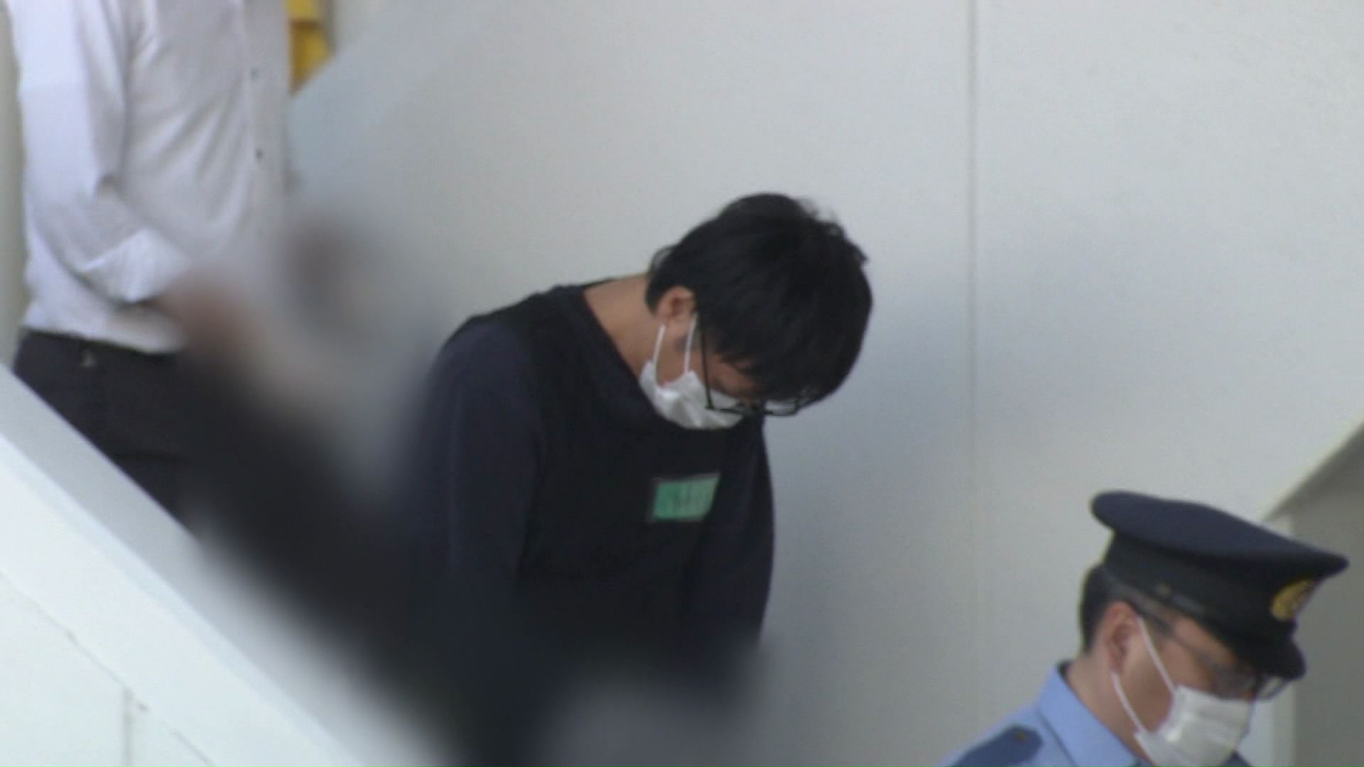 身柄を送られる柘野容疑者