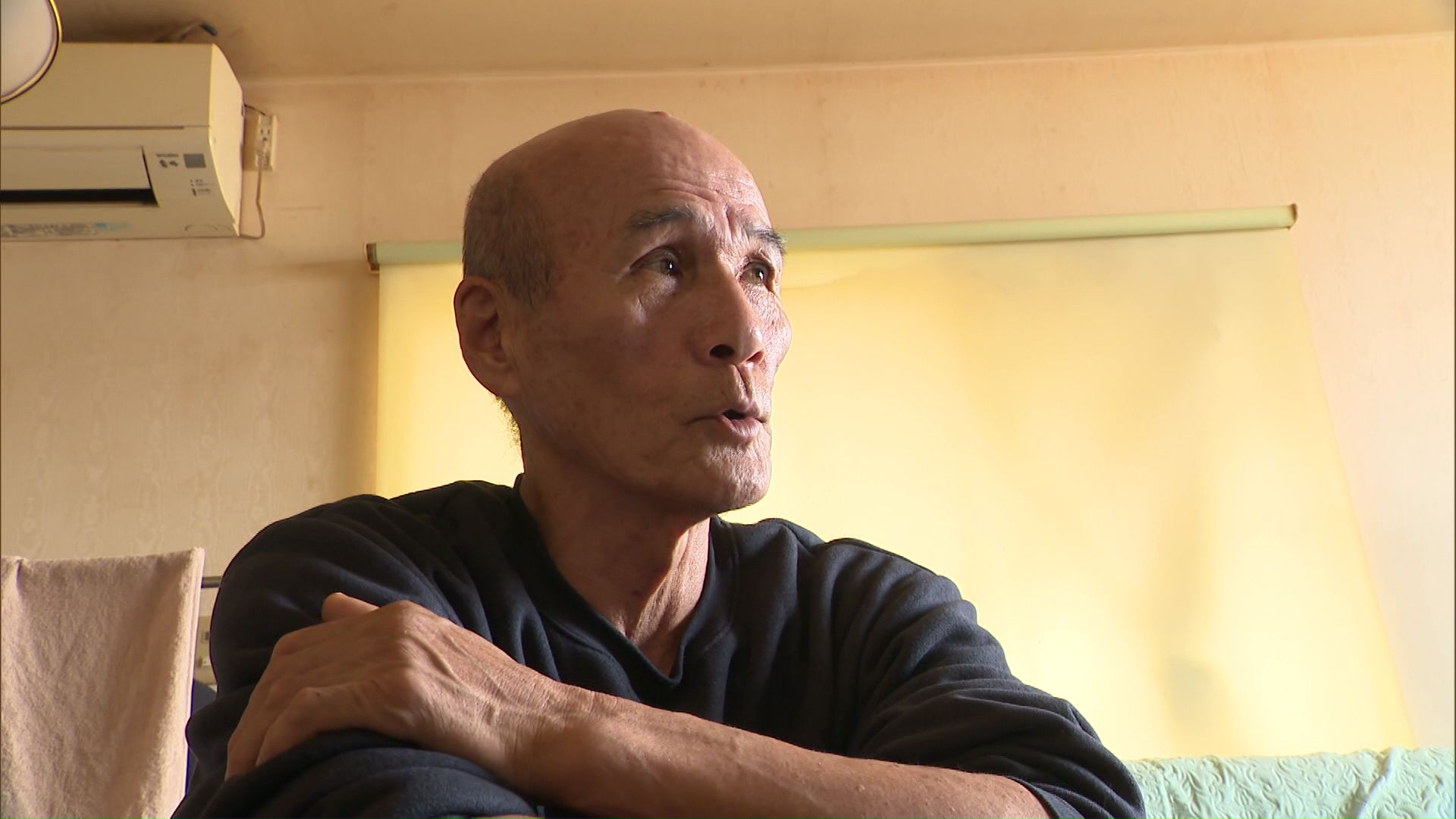 地元のイカ漁師