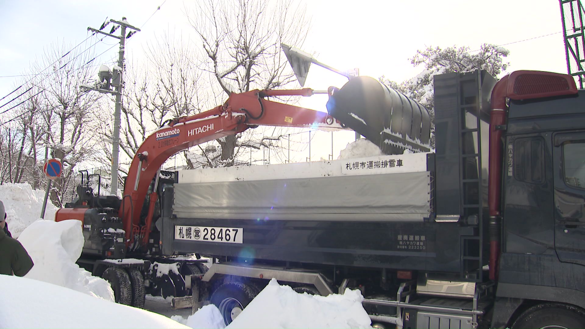 排雪完了の時期を3月上旬に再設定