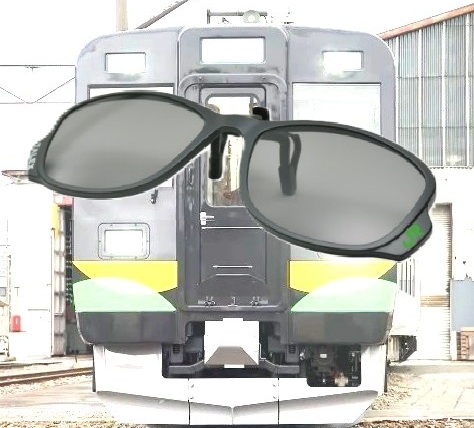 クリップオンサングラス（背景は737系）