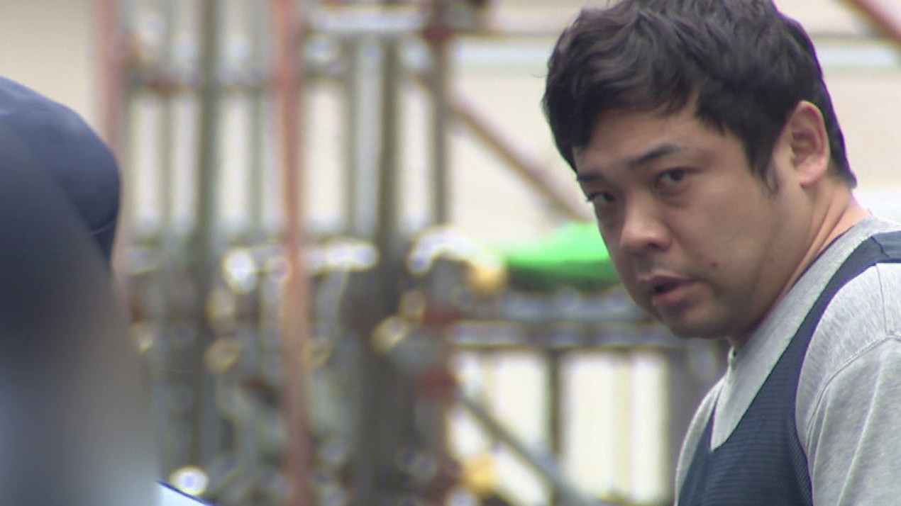 送検される上村章太郎容疑者