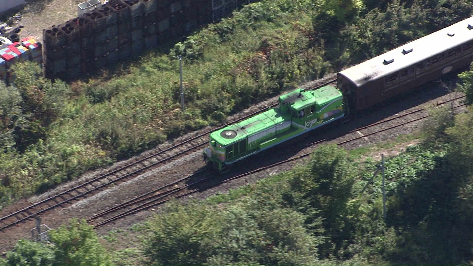 美瑛町の丘陵地帯を走るノロッコ号